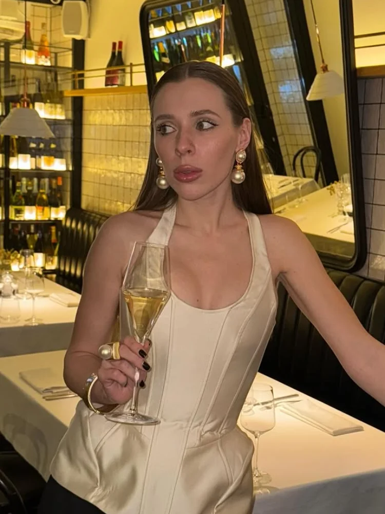 

Женский однотонный корсет без рукавов с лямкой на шее, сексуальный жилет с открытыми плечами и U-образным вырезом на талии, тонкий короткий топ 2026, женские шикарные топы High Street