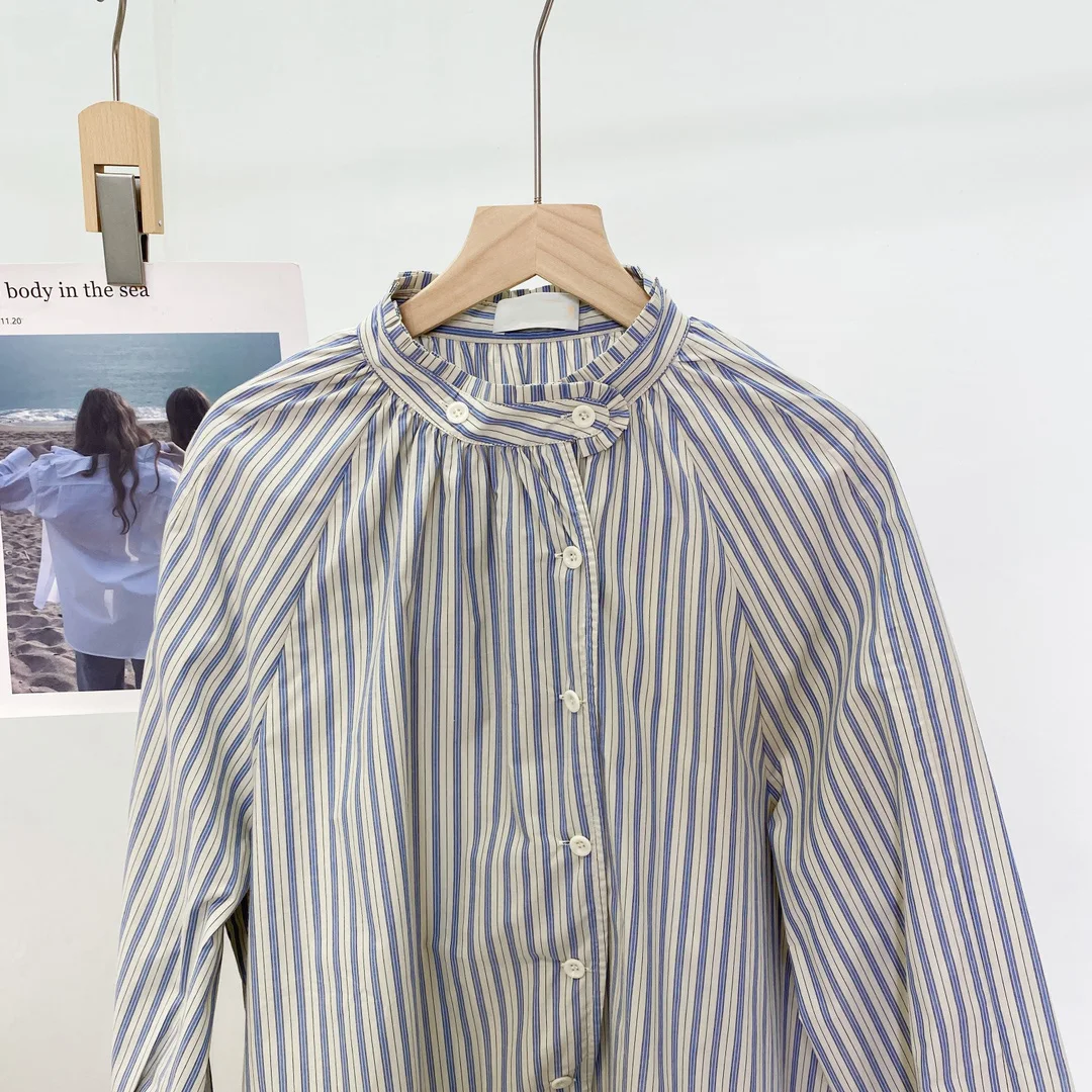 

Women's Clothing The new irregular stand-up collar striped shirt is lazy, casual and fashionable!