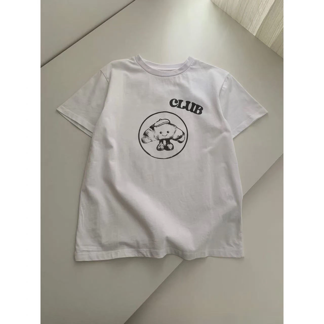 

Женская футболка KAILE Early Spring в американском ретро-стиле с принтом, свободного кроя, с круглым вырезом, влагоотводящая, короткий рукав.