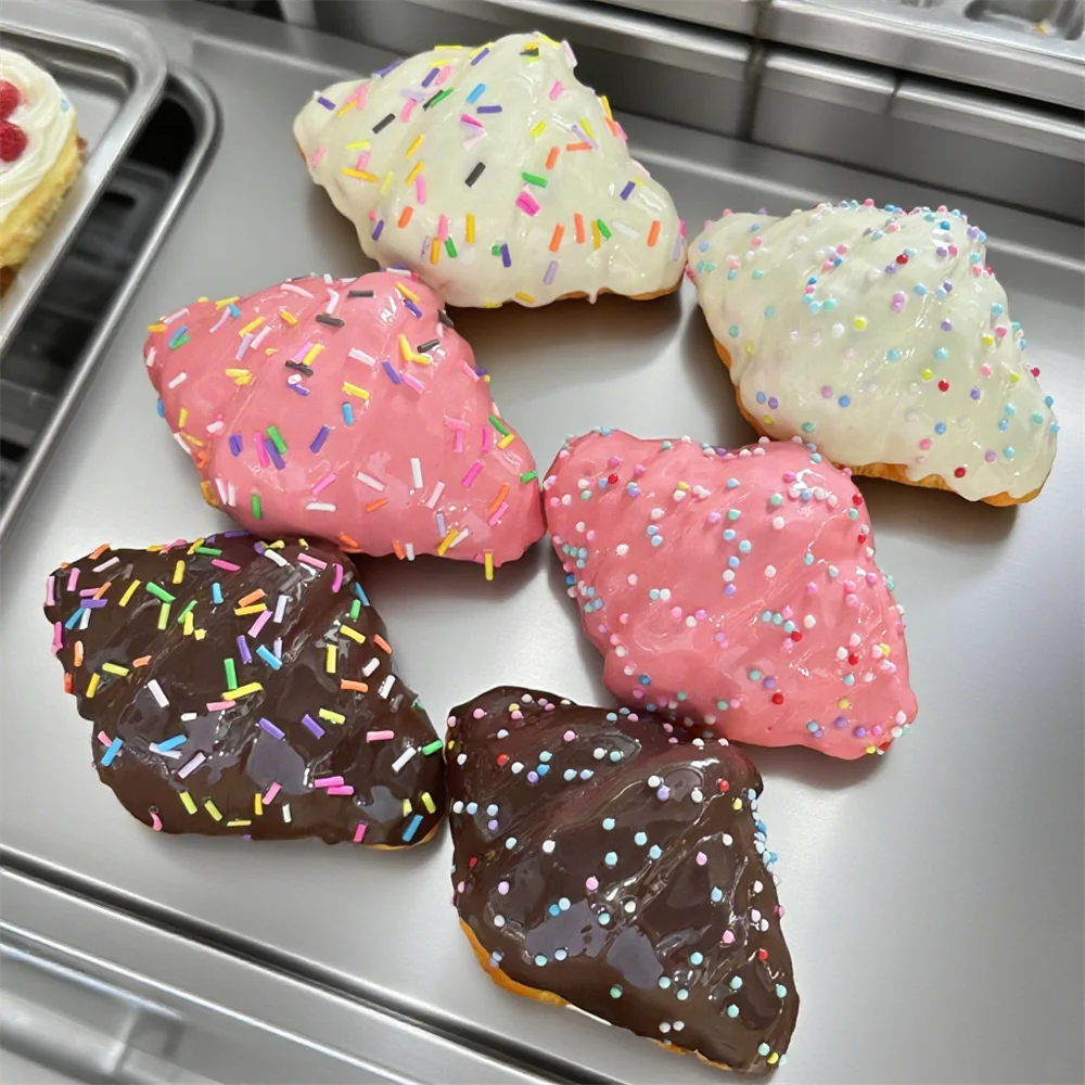 

Exquisite Pink Frosted Croissant Colorful Sprinkles Handmade Dessert Gifting Crafted Covered Smooth Sweet Taste Buds Snack Model