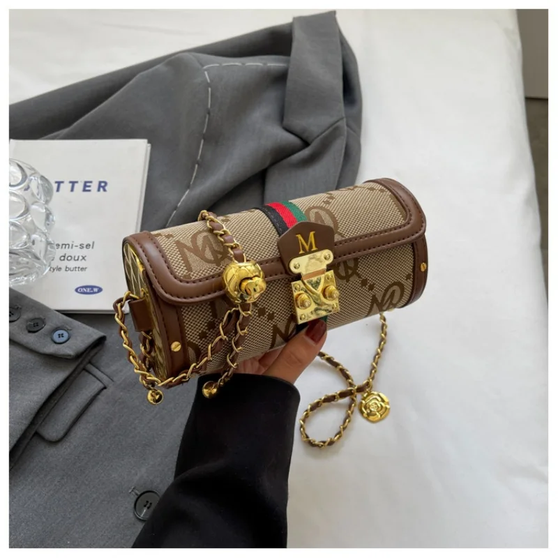 

Light luxury brand-name high-end designer bag female 2025 new niche shoulder bag messenger bag cylinder bag