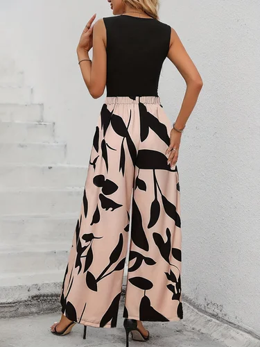 Imagen 2 del producto Elegante conjunto con estampado de hojas, perfecto para uso casual o vacaciones de todos los días. El conjunto de dos piezas incluye una camiseta y pantalón de punto.