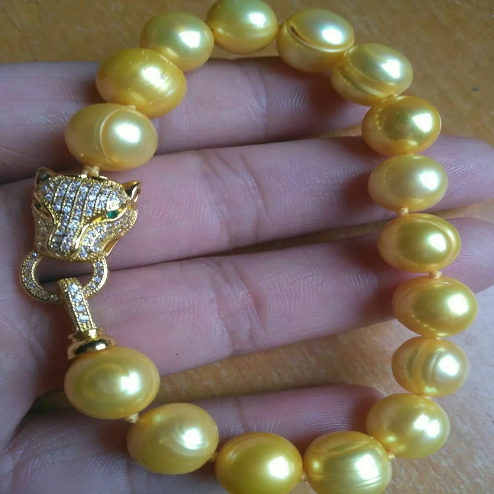 

Hot selling AAA+11-12mm OUT Sea Gold Pearl Bracelet 7.5-8-inch Baroque 925s