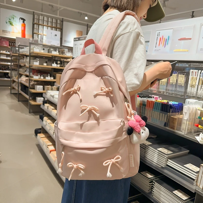 

Модный рюкзак с бантом, рюкзак для ноутбука, большая вместимость, студенческие сумки для книг, однотонный стильный рюкзак с подвесками, дорожный рюкзак