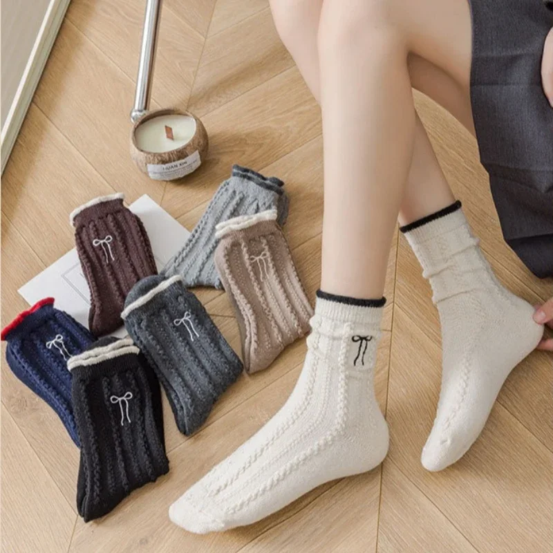 

7 pairs of simple comfortable wool socks for autumn winter thickened warm butterfly knot embroidered mid tube socks