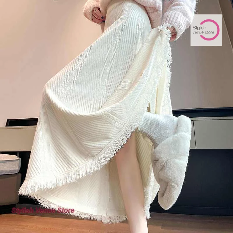 

Korean tassel knit skirt women's autumn and winter new temperament high sense long wool casual fashion Joker A-line skirt.