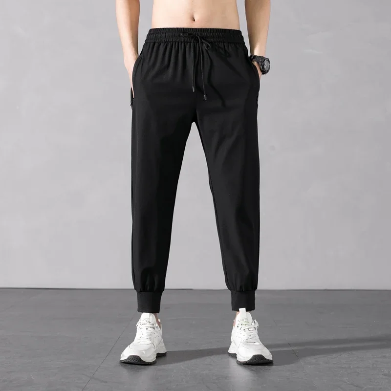 Simple Zippered Pocket Men's Solid Color Pants Business Stretch and Versatile Jogging Bottoms Classic Black Sports Men's Slacks
