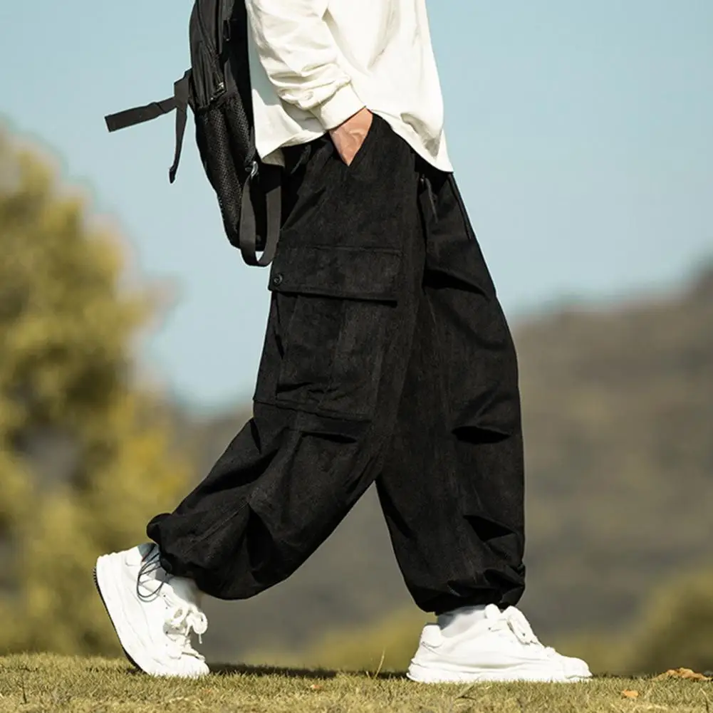 Pantaloni da uomo con coulisse pantaloni Cargo in velluto a coste stile Vintage con Multi tasche per uomo Streetwear gamba dritta vestibilità ampia per esterno