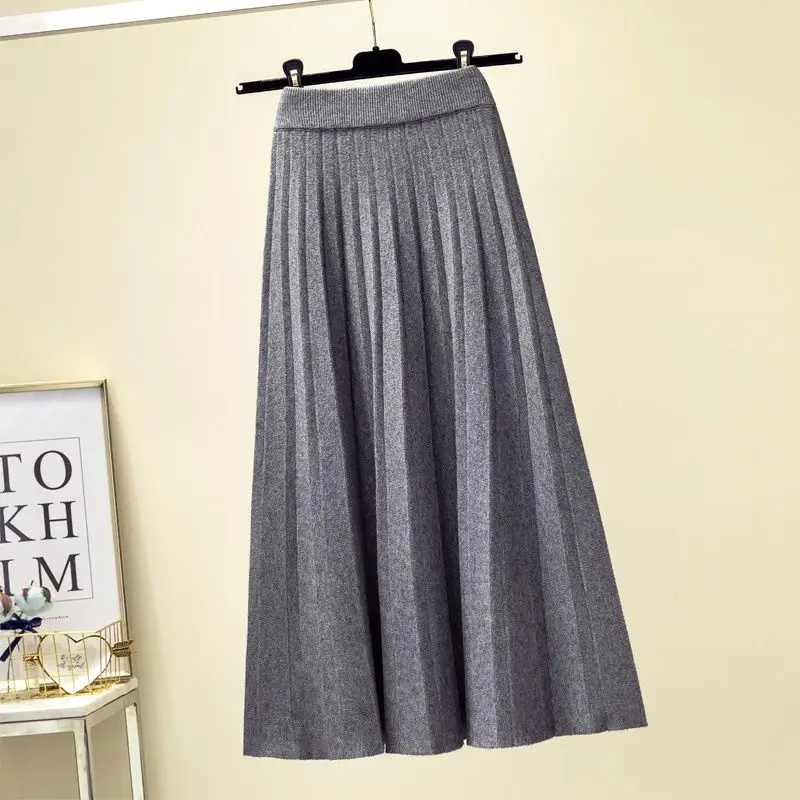 

Skirt female Autumn and winter high -waist knitted skirt women's medium long wool A -shaped school style pleated skirt female