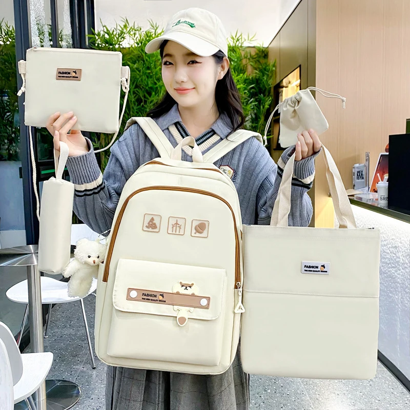 

Simple and versatile solid color student backpack for women, large-capacity casual five-piece backpack set