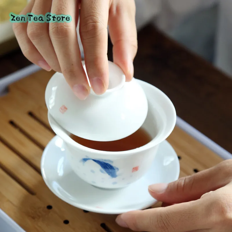 Hand Painted Under Glaze Fish White Porcelain Cover Bowl Large Simple Chinese Kung Fu Three Tea Bowl To Tea Cup Ceramic Tea Set