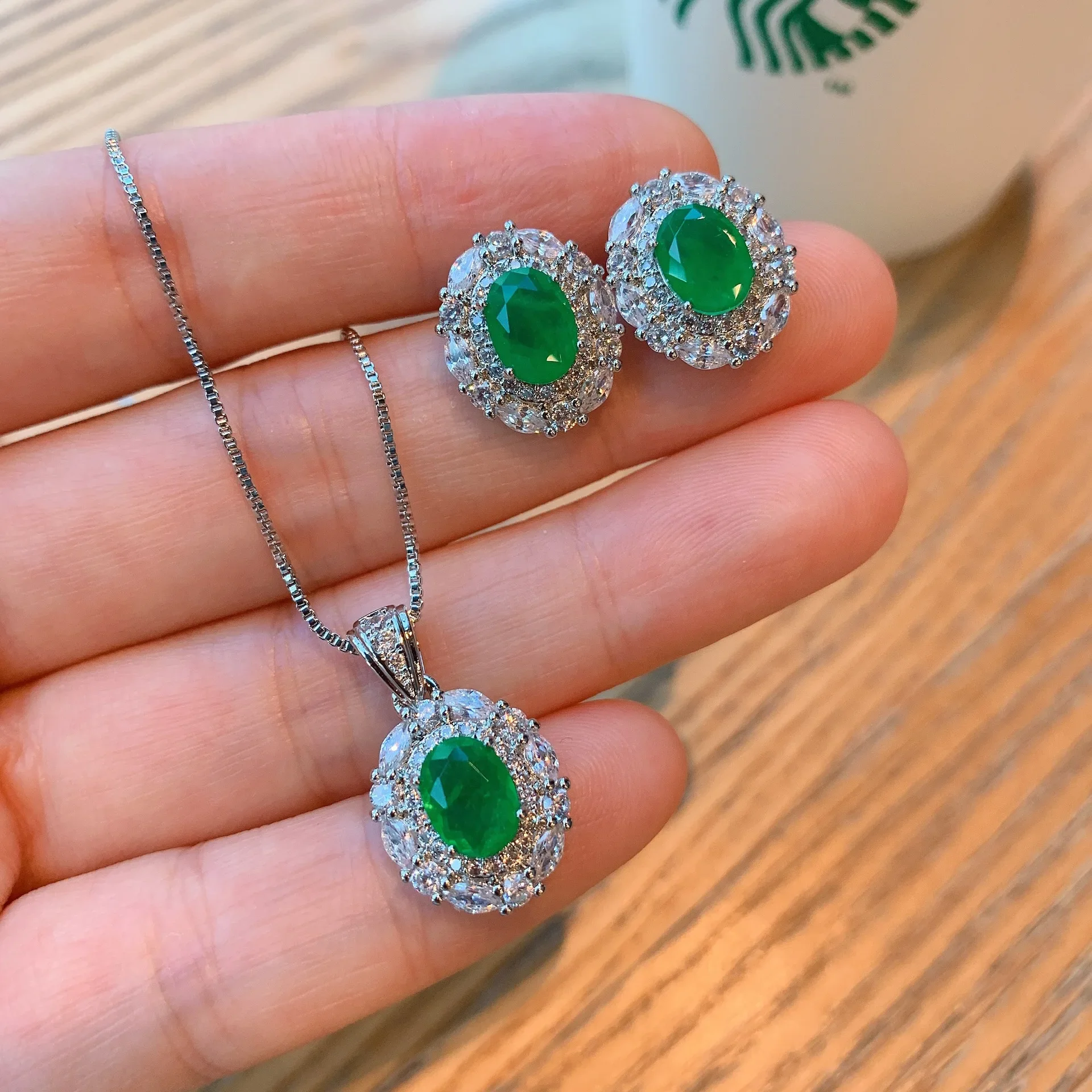 

Elegant Oval Green Gemstone Necklace and Earrings with Dazzling CZ Accents Perfect for A Timeless and Sophisticated Look Jewelry