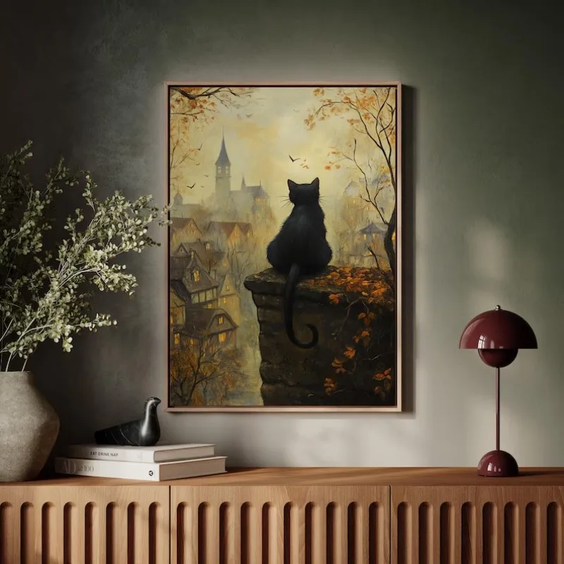 

Black Cat Autumn Wall Art – Vintage Halloween Cat Watching Village Scene, Gothic Fall Print, Mystical Animal Canvas Poster