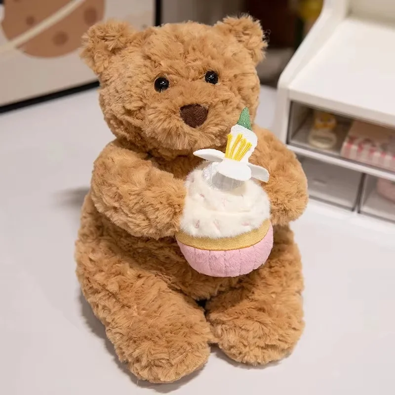 

Cake Bear plush toy, a plush doll holding a birthday cake, a cute cartoon gift doll, a birthday present.