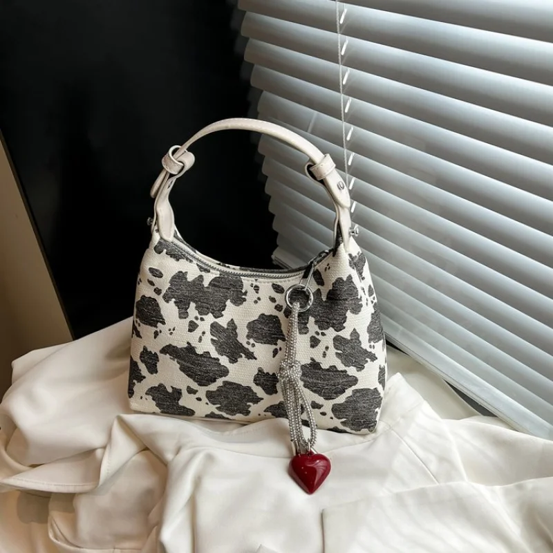 

Luxury Brand Inspired Women Handbag With Signature Pattern For Fashionable Outings And Events
