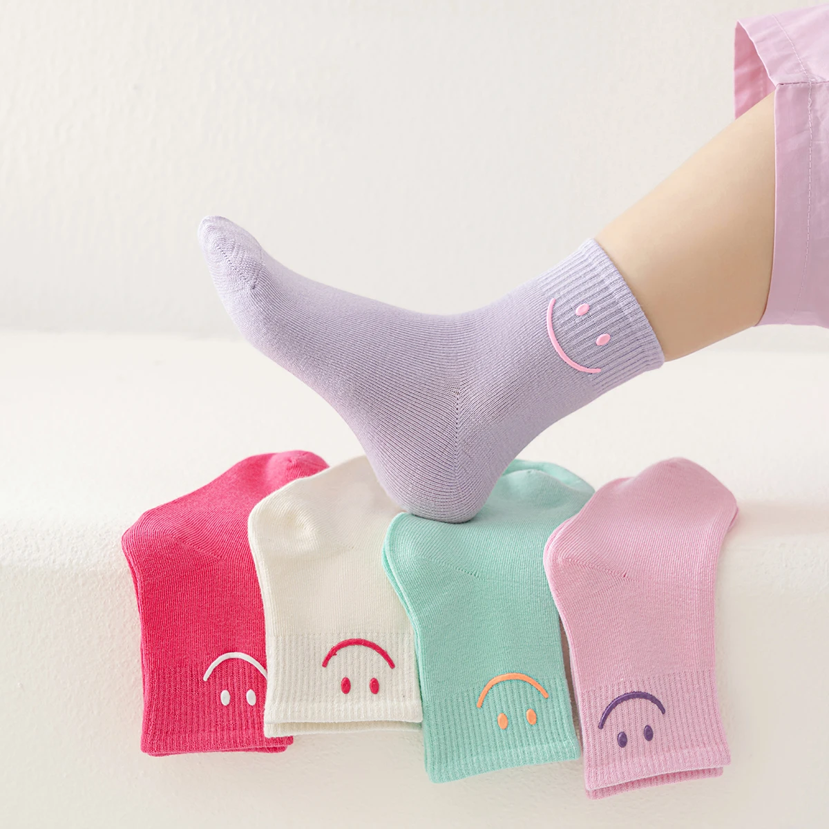 5 pairs of solid colored smiling face dopamine colored mid tube children\'s round socks, suitable for both men and women