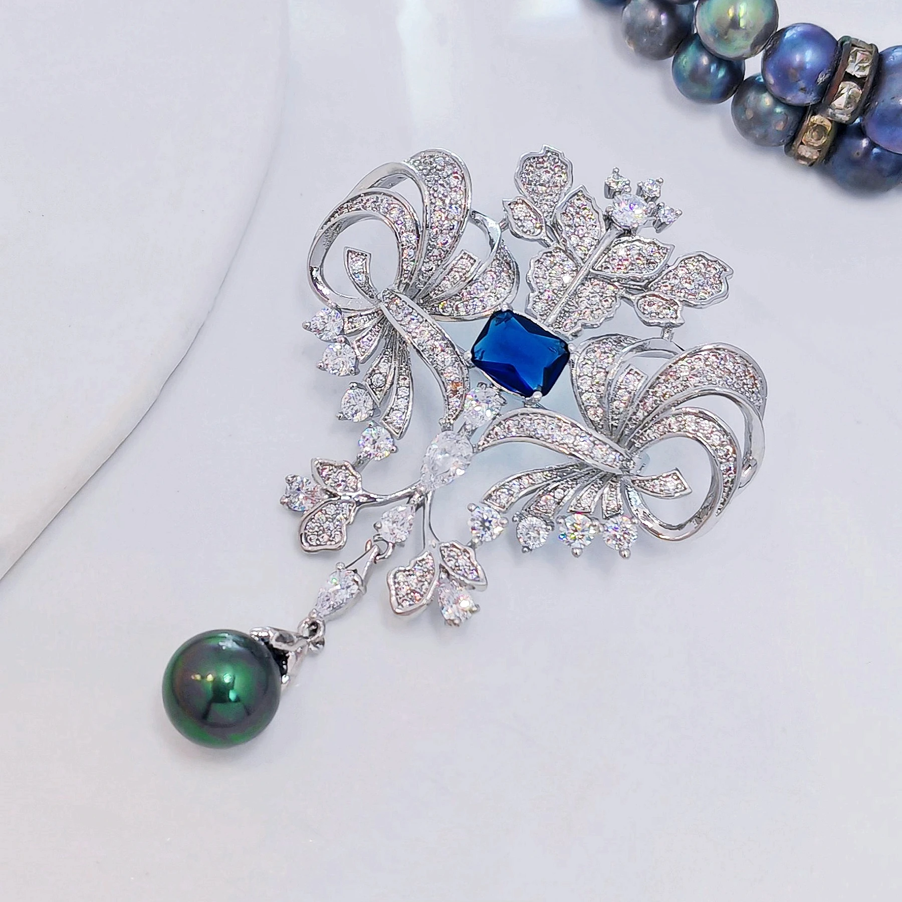 Royal Scroll Blue and White CZ Brooch with Black Pearl Drop