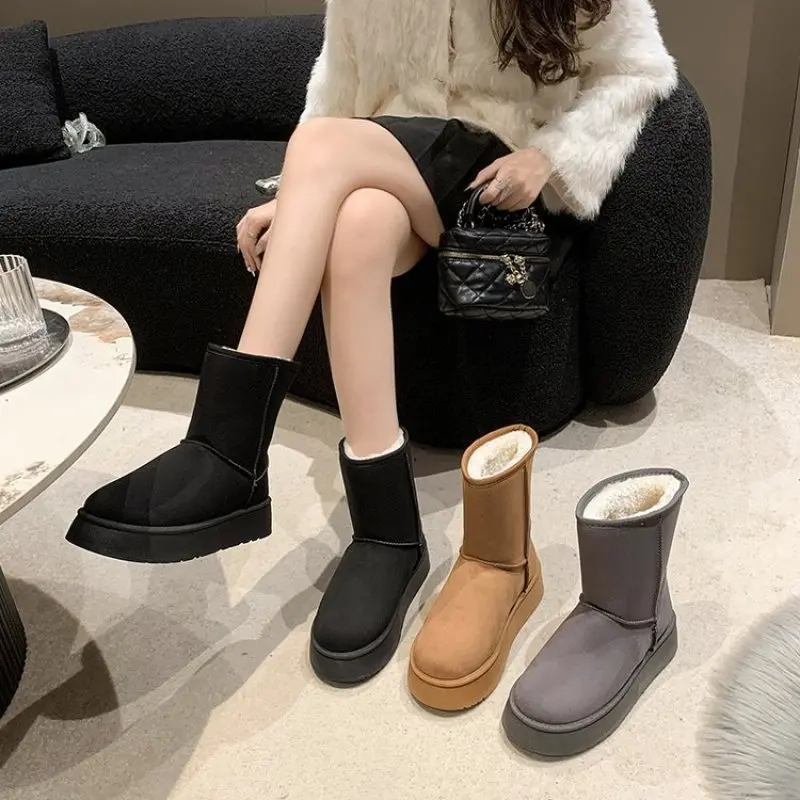 Botas de nieve de piel de oveja auténtica para hombre y mujer, zapatos cálidos de lana de corte bajo, botas cortas informales a la moda, invierno, 2024