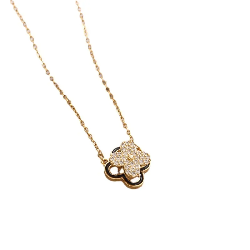 

simple and creative four-leaf clover necklace, women's rotating cutout diamond-encrusted cross chain, versatile jewelry
