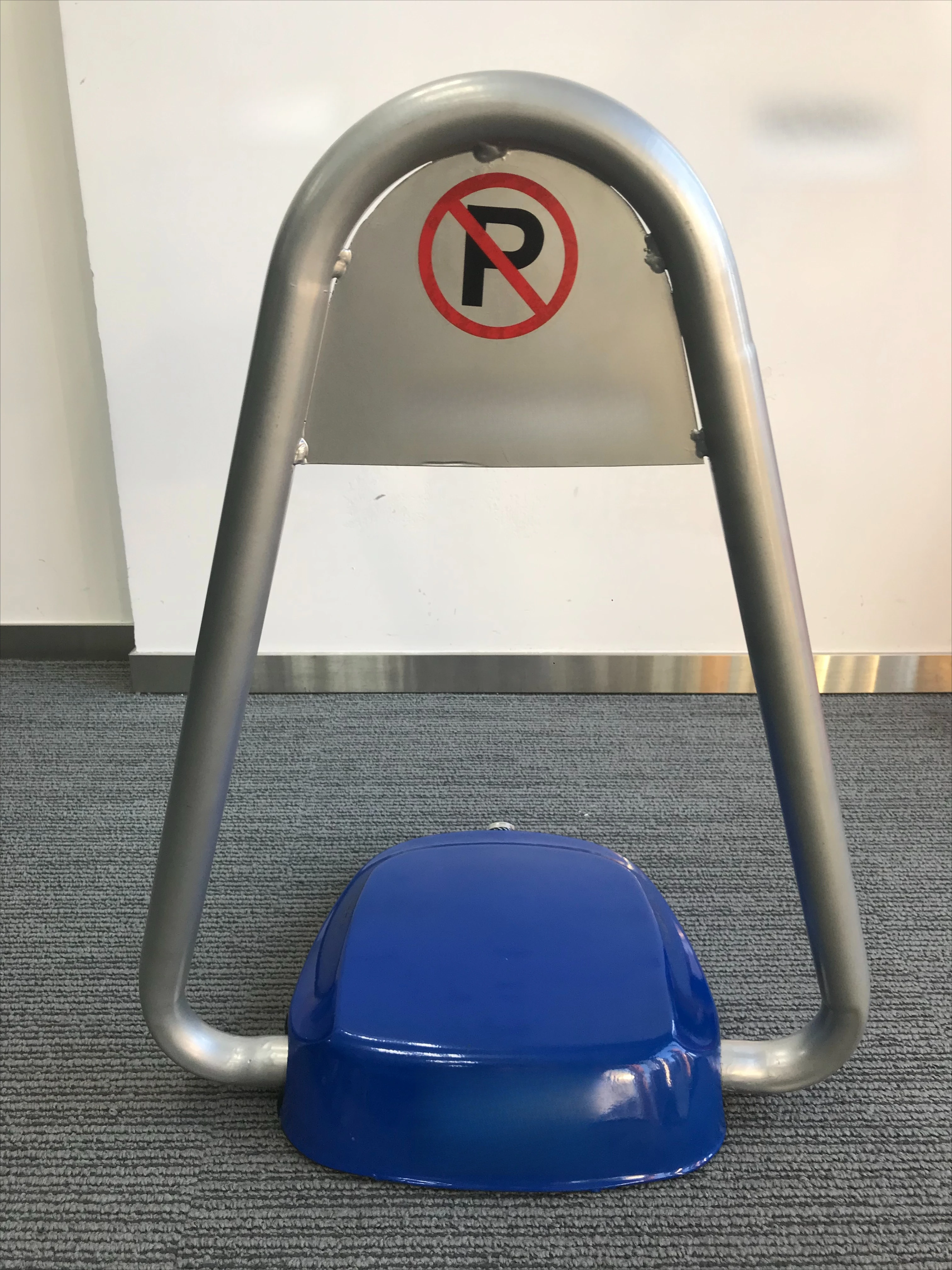 Remote control parking lock reserves yellow personal private car parking lot space