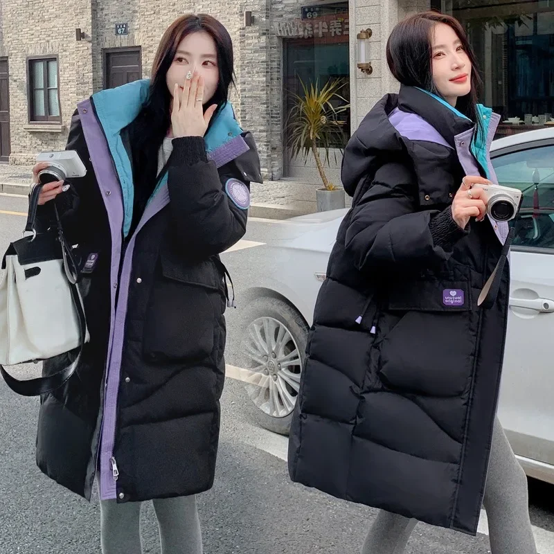 

Winter Hooded Women Jacket 2025 New Spliced Pockets Color Block Coat Fashion Mid Long Styles Loose Overcoat Female Warm Parkas