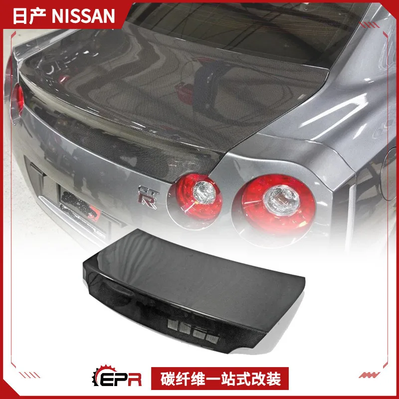 

Подходит для модификации Nissan R35 GTR, крышки багажника из углеродного волокна, оригинальная модель, замена задней крышки багажника.