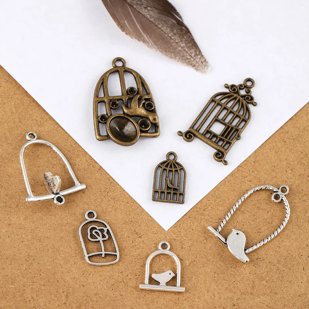 

Alloy DIY jewelry, vintage birdcages, hollowed-out landscape pendants, fashionable clothing accessories