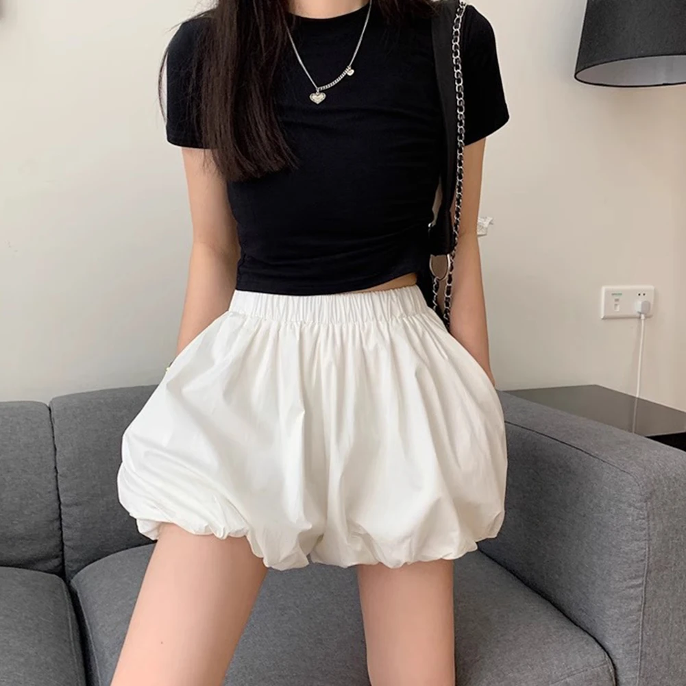 Stylowa damska krótka spódnica z elastyczną talią na każdą porę roku - wygodna odzież codzienna w kolorach czarnym i białym, rozmiary S-XXL