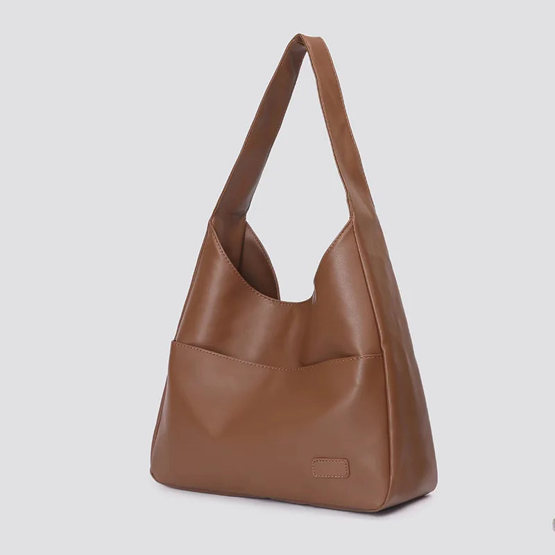 Große Tragetasche, neue schwarze Lederhandtasche, schlichte, lässige Damenhandtasche für den täglichen Gebrauch, modische und vielseitige Umhängetasche. – Detail 17