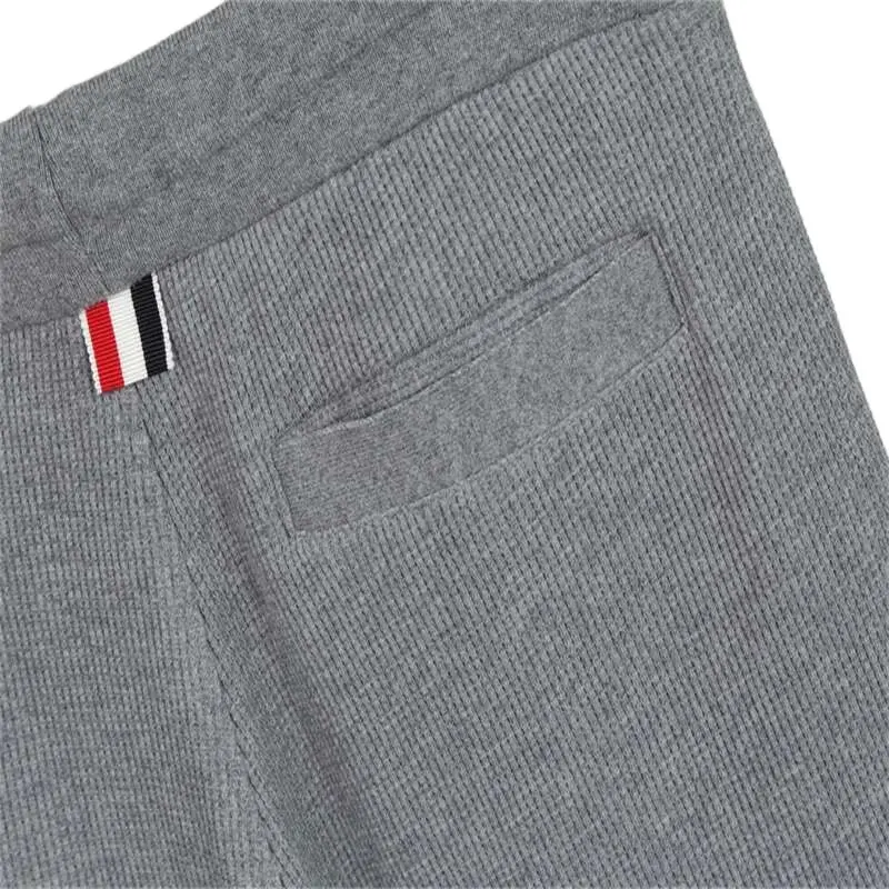 Pantaloncini da uomo TB BROWIN Luxury Brand THOM pantaloni estivi Classic Cotton 4-Bar Stripe pantaloncini grigio chiaro Sport Casual Harajuku