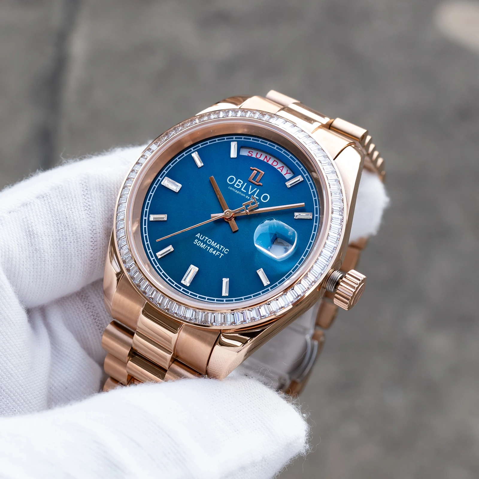 OBLVLO Men's Rose Gold Mechanical Watch with Gemstone Bezel Blue Dial Date Day Function Bracelet Elegant Timepiece RX-DD-SD