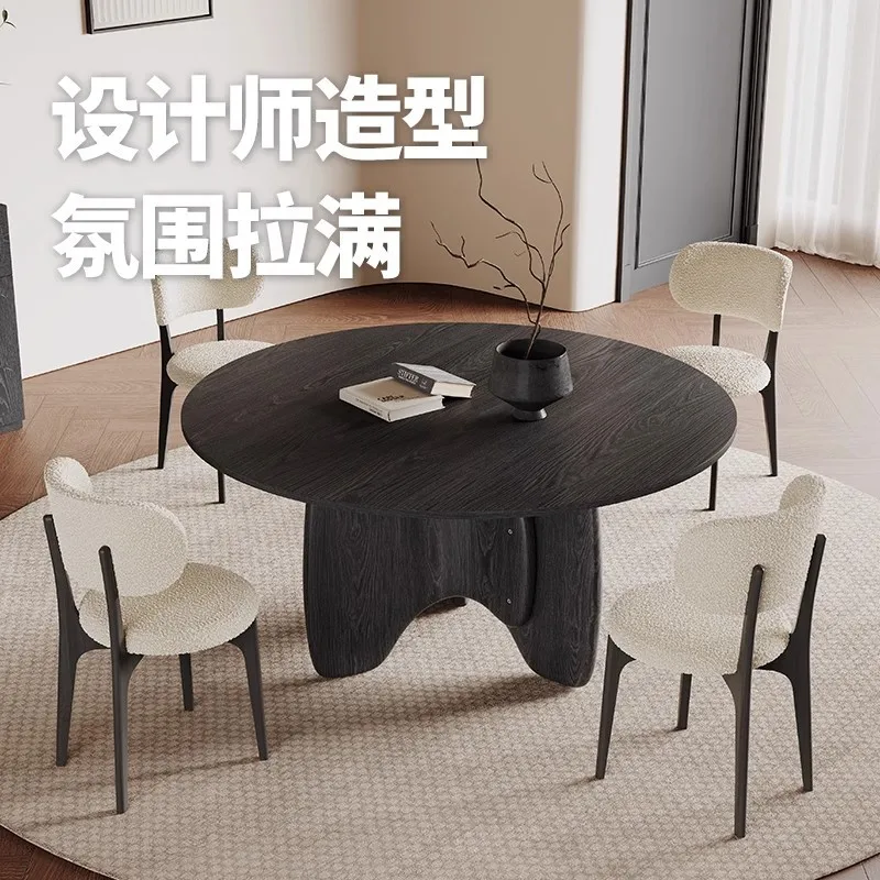 

Retro all solid wood round dining table household 1.2 meters 2024 new ash wood medium antique black solid wood dining table and