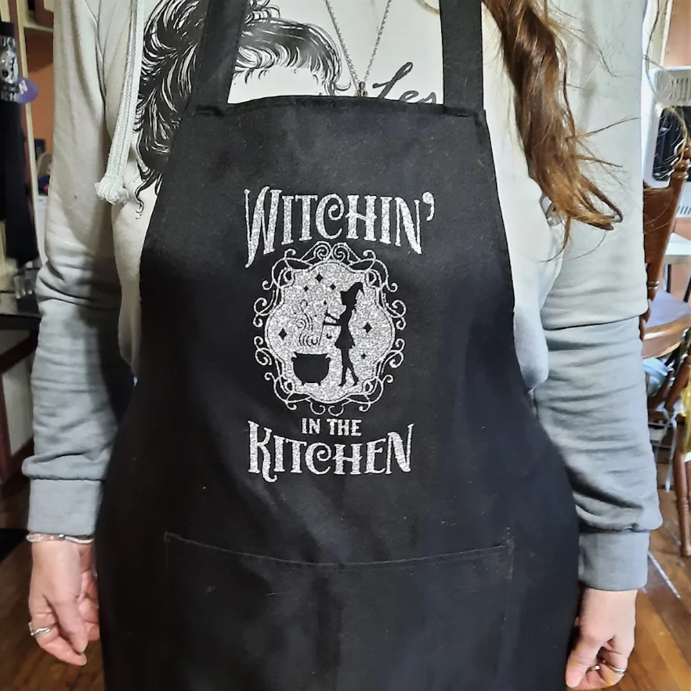 

Witchin’ in The Kitchen Halloween Apron Spooky Season Home Kitchen Accessory Fall Housewarming Hostess Gift Witchcraft Cauldron