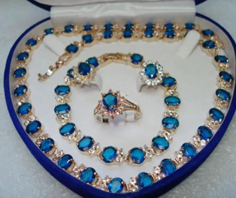 

очаровательный и благородный комплект ожерелья с синим цирконом и серег-браслетов