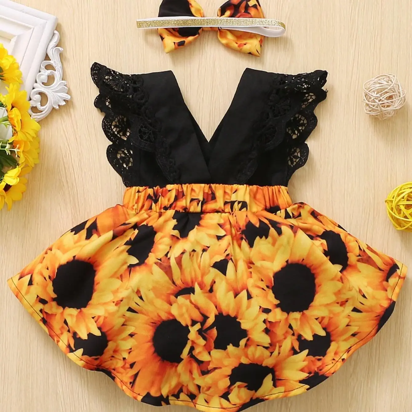 Baby girl black sleeveless lace stitching sunflower print ha-ha dress