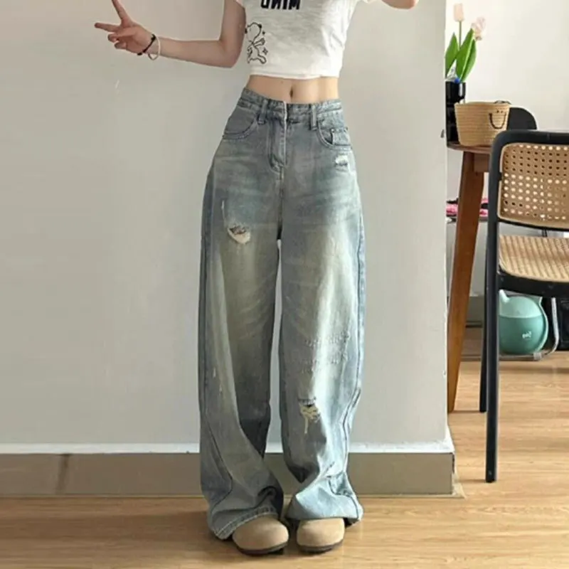 レトロな女性のハイウエストルーズストレートリッピングホールバギージーンズ女性のファッションストリートウェアブルーデニムパンツ