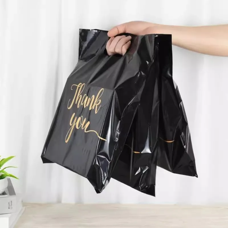 

1000pcs Eco friendly Customized Hand-held Gift Bag Thank You Hot Stamping Printing Die Cut Black/White Plastic Shop Bag