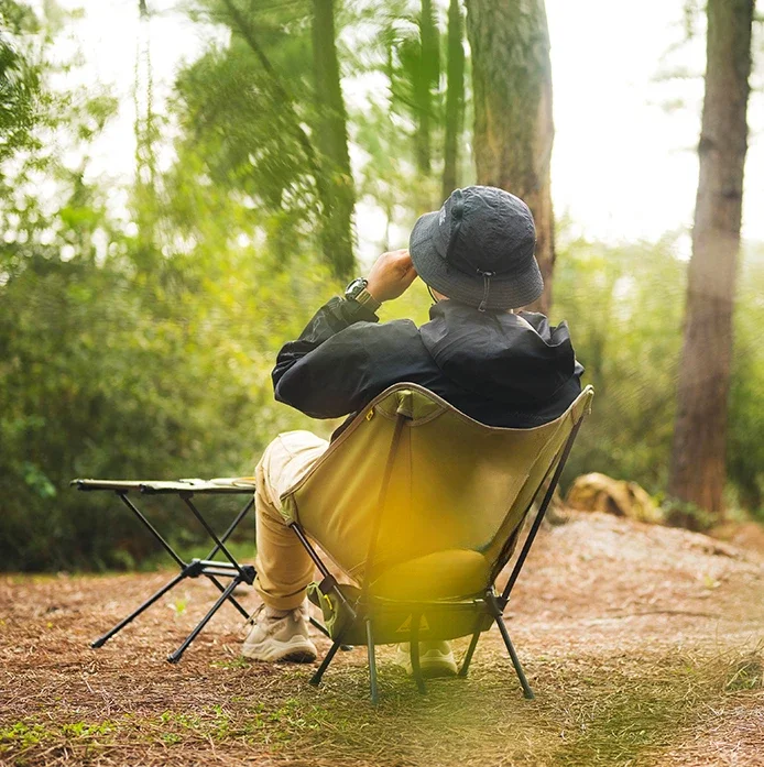 few customers outside camping and cycling, lightweight folding chairs, adults and children, portable storage moon tactical