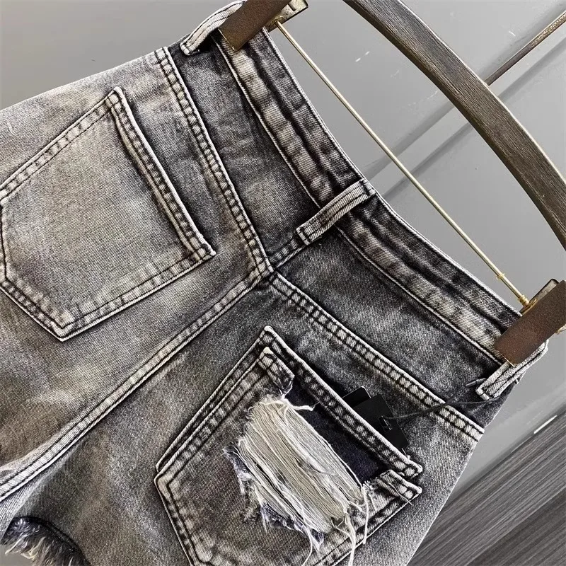 Worn Legs with Rough Edges Washed Black Denim Shorts 2026 Summer New Women Fashion A-line Wide Leg Hole Ripped Denim Shorts