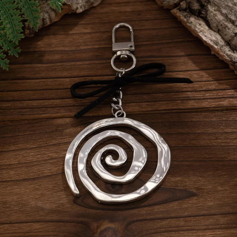 Nuevo llavero con colgante en espiral de aleación, accesorios de moda únicos y geniales, lindo Punk para hombres y mujeres, bolso para teléfono, adorno, regalos de fiesta