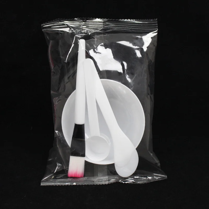 Juego de cuatro piezas de cepillo de máscara de plástico, cuenco de máscara de ajuste, palo de máscara, cuchara medidora, herramienta de belleza