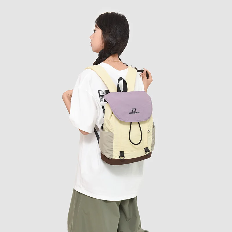 Waterproof nylon light backpack men and women with the same type of student schoolbag color large capacity travel backpack