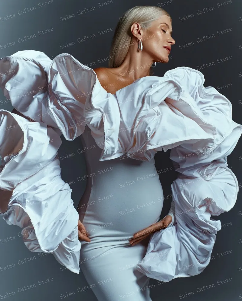 Elegant White Gown With Puffy Sleeves And Mermaid Train Flowing Fabric Highlights Feminine Curves And Grace Elegant Maternity