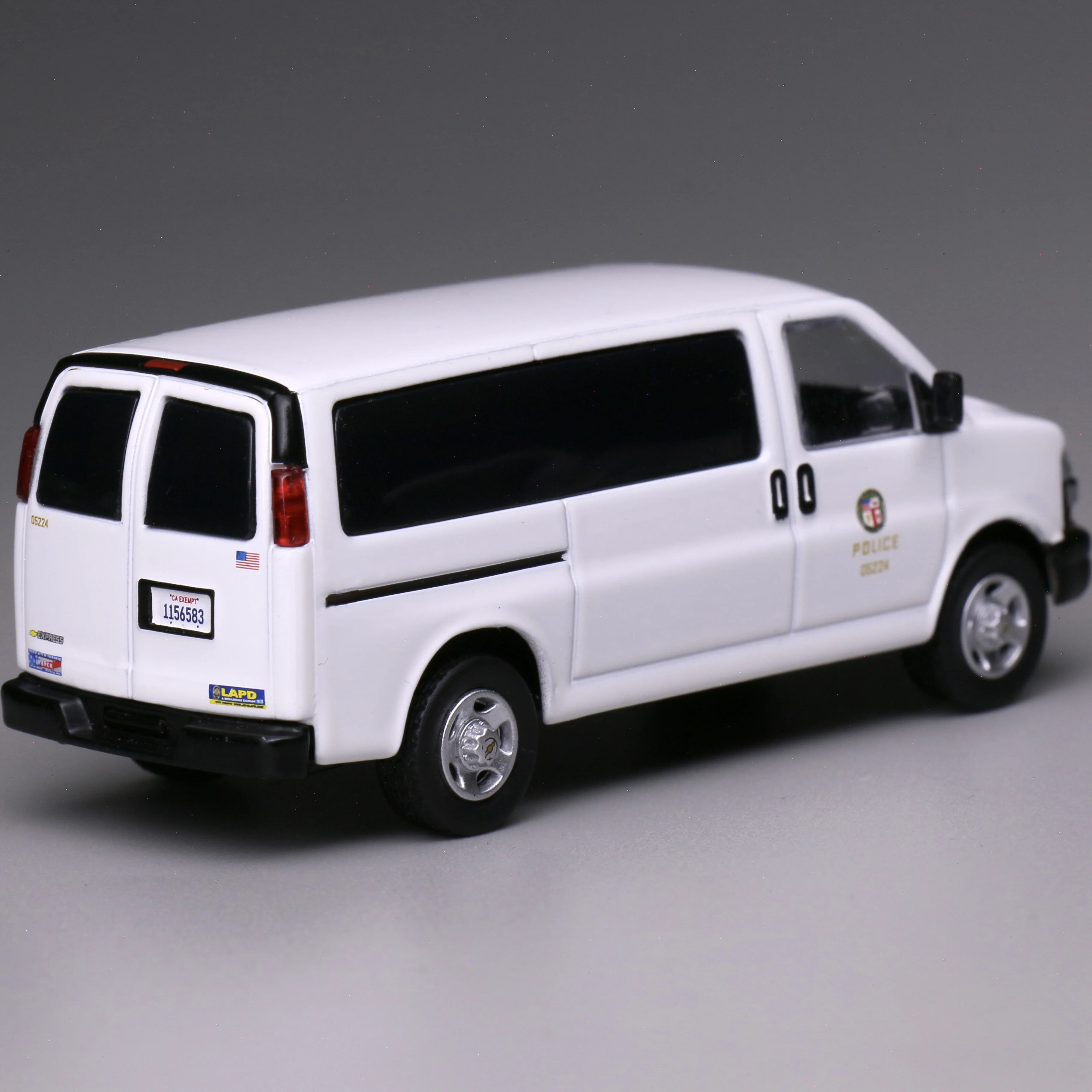 596 รุ่น 1:64 รถตํารวจทาสีขาวไม่มีไฟตํารวจDiecastรถรุ่นของเล่นเด็กและของขวัญ