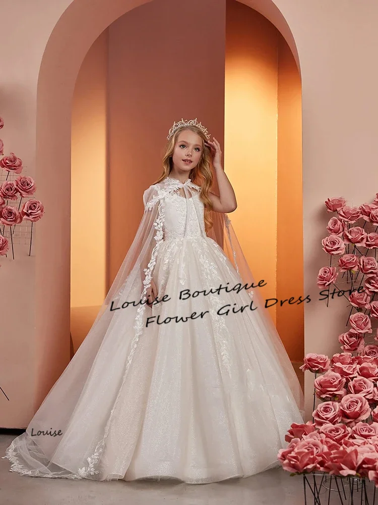 فستان فتاة الزهور بأكمام كيب عاجي لامع من التل على شكل حرف a مزين بالدانتيل بطول الأرض فستاين سهرة/فساتين الحفلات للفتيات فساتين التواصل الأول