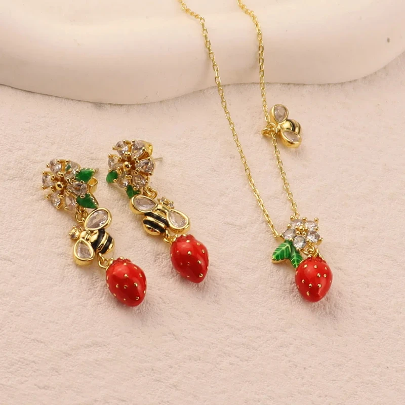 

New Year Series Red Strawberry Big Bee Cubic Zircon Flower Design Inlaid with Glasses Handmade Enamel Necklace Earring Set Women