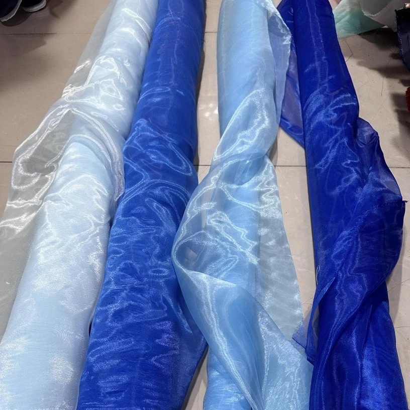 Klein Blue Sky Blue Superficie luminosa Tessuto a rete metallica luminosa Decorazione stile matrimonio Tenda Design di abbigliamento