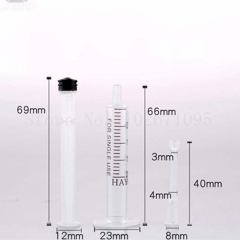 Dispensador de Perfume de jeringa de plástico transparente con escala, botella de Perfume portátil de viaje, herramienta de embalaje, 2ml