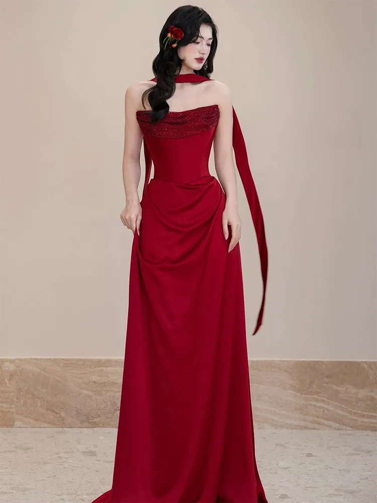 

A new off-the-shoulder unique and elegant morning dress in wine red for toasting