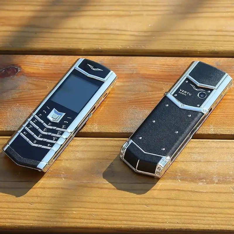 Luxury V10 Phone with Metal Leather Body Dual Card Slot Invisible Keyboard FM Radio And Camera - Premium Unisex Design